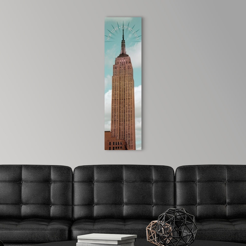 A modern room featuring The Empire State Building in New York City with a halo at the spire.