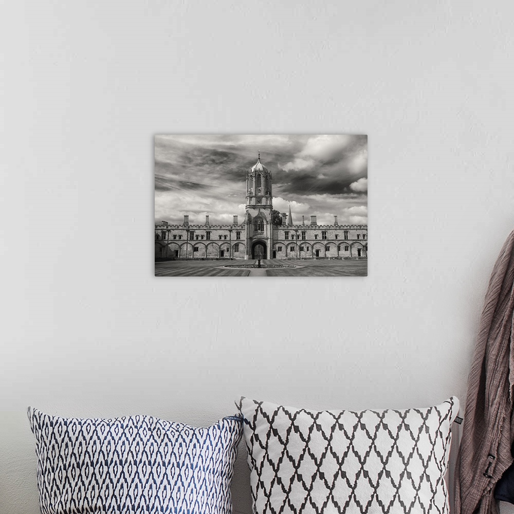 A bohemian room featuring Black and white photograph of the steeple of Christ Church at Oxford, England.