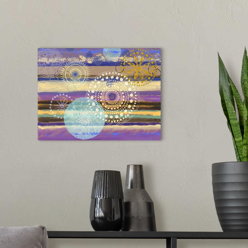 A modern room featuring Abstract artwork of horizontal layers of yellow and purple, embellished with circular prints.