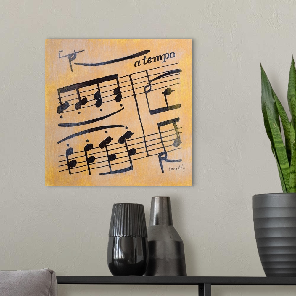 A modern room featuring Square painting of black sheet music on a metallic gold background.