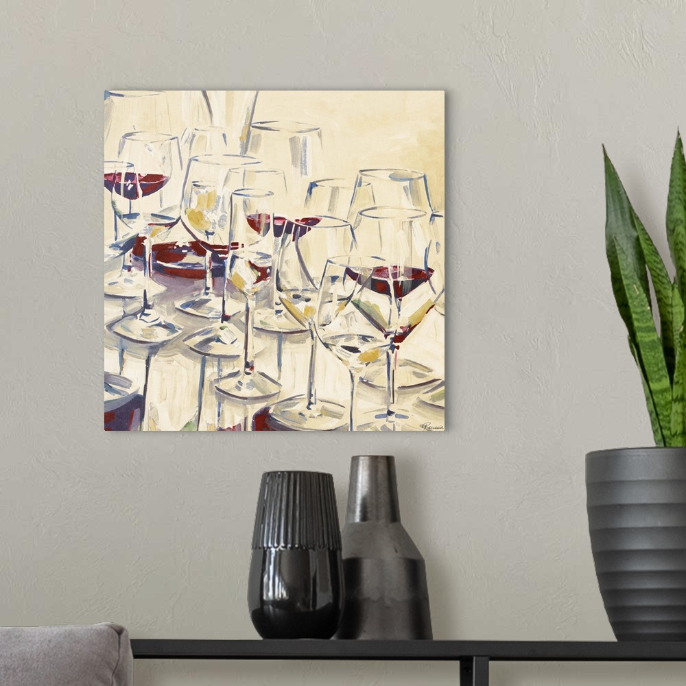 A modern room featuring A collection of wine glasses with red wine inside.