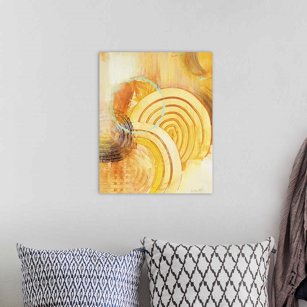 A bohemian room featuring Contemporary abstract painting in gold using circles and organic shapes.