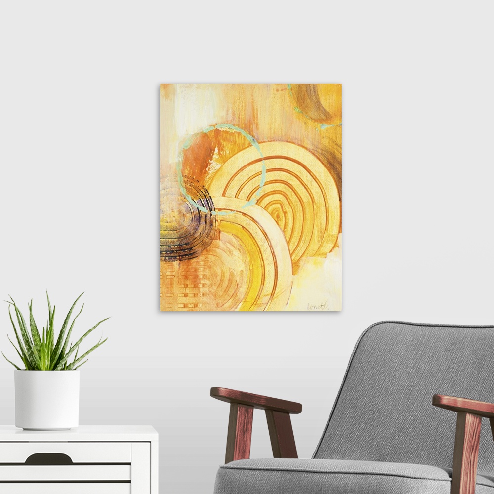 A modern room featuring Contemporary abstract painting in gold using circles and organic shapes.