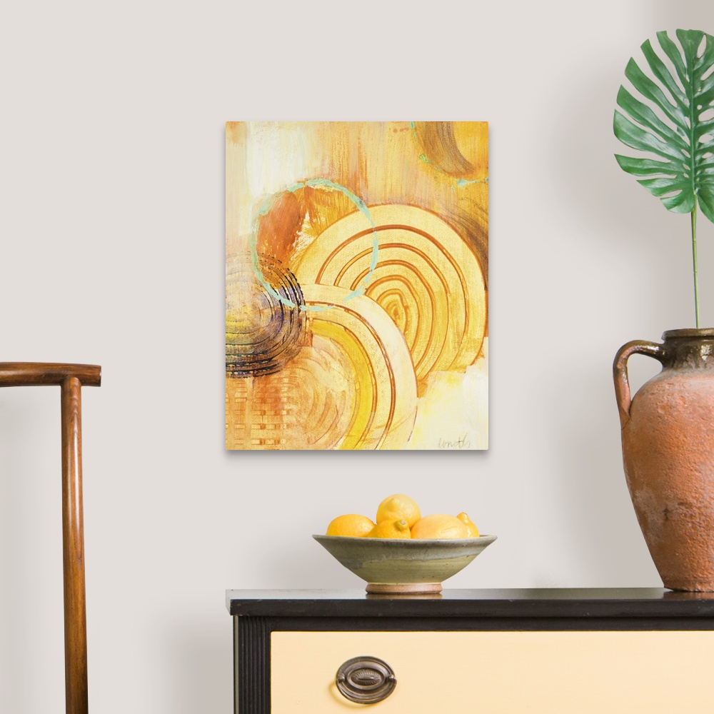 A traditional room featuring Contemporary abstract painting in gold using circles and organic shapes.
