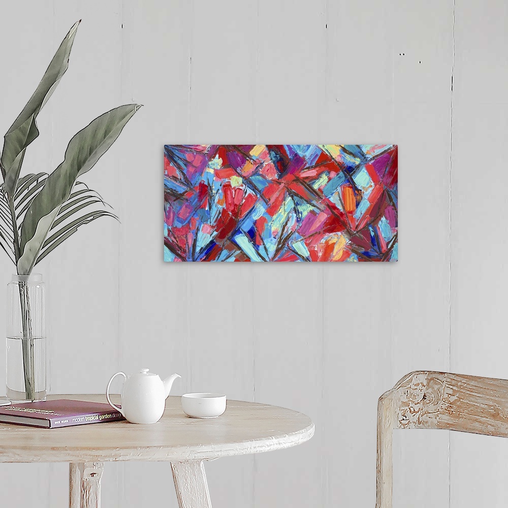 A farmhouse room featuring Vivid blue and red abstract artwork.