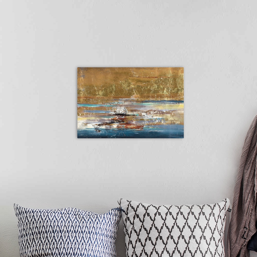 A bohemian room featuring Abstract textured artwork with gold and blue.