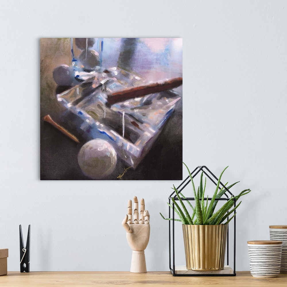 A bohemian room featuring Contemporary painting of a large glass ashtray with a cigar resting in it and a golf ball and tee...
