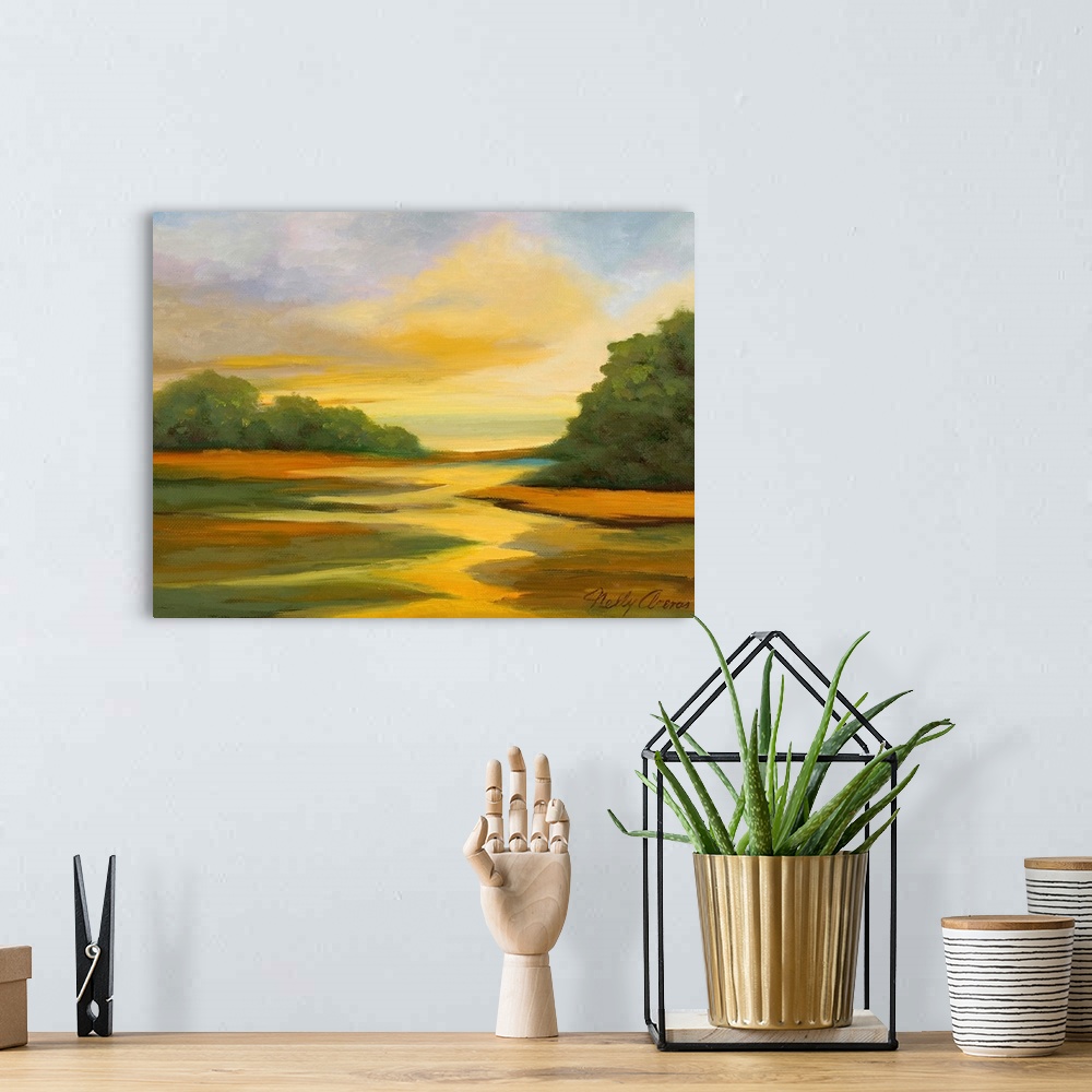 A bohemian room featuring Contemporary landscape artwork of a field at sunset.