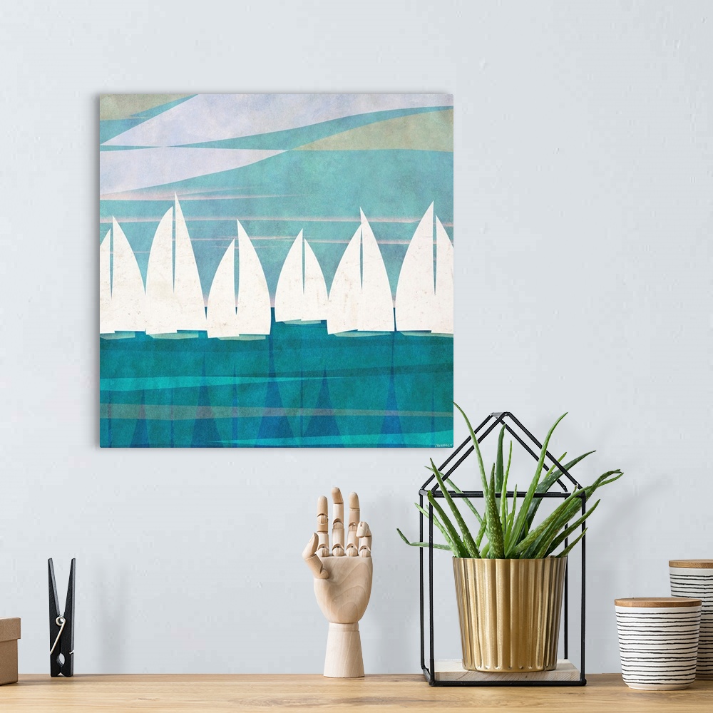 A bohemian room featuring Digital art piece of silhouetted sail boats with the sails up as they glide across the water.