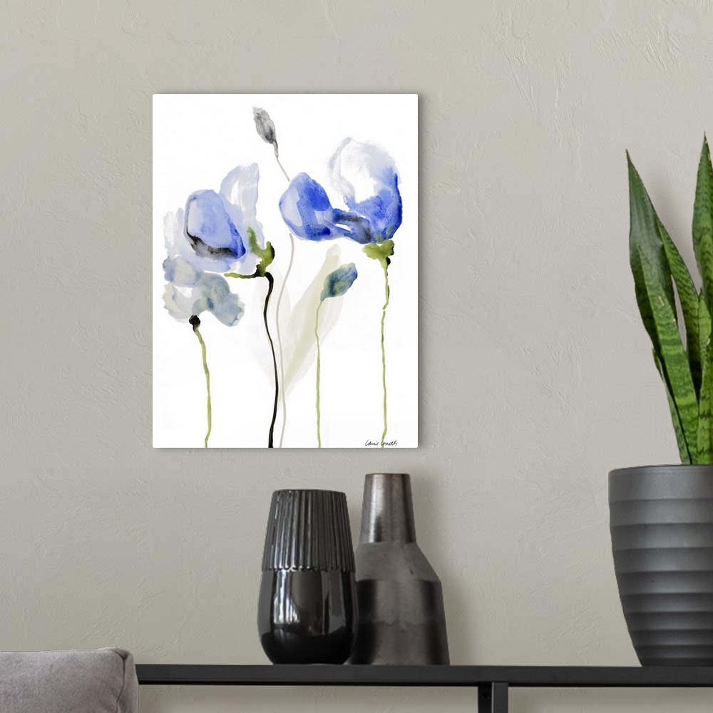A modern room featuring Watercolor painting of blue poppies against a white background.