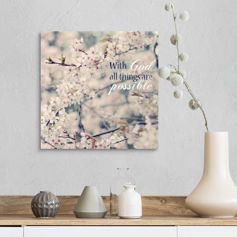 A farmhouse room featuring Square photograph of floral tree branches with white and pink flowers and the Bible verse "With G...