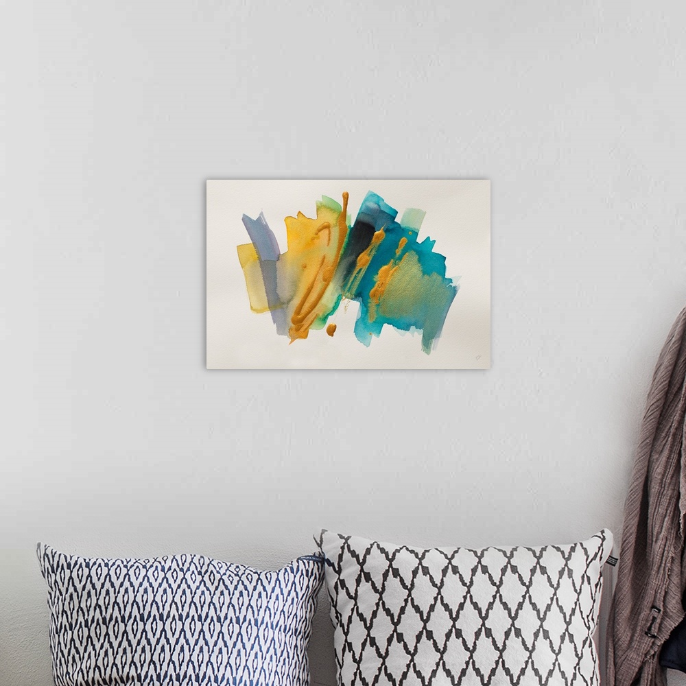 A bohemian room featuring Gold and blue brush strokes decorate a horizontal abstract artwork.