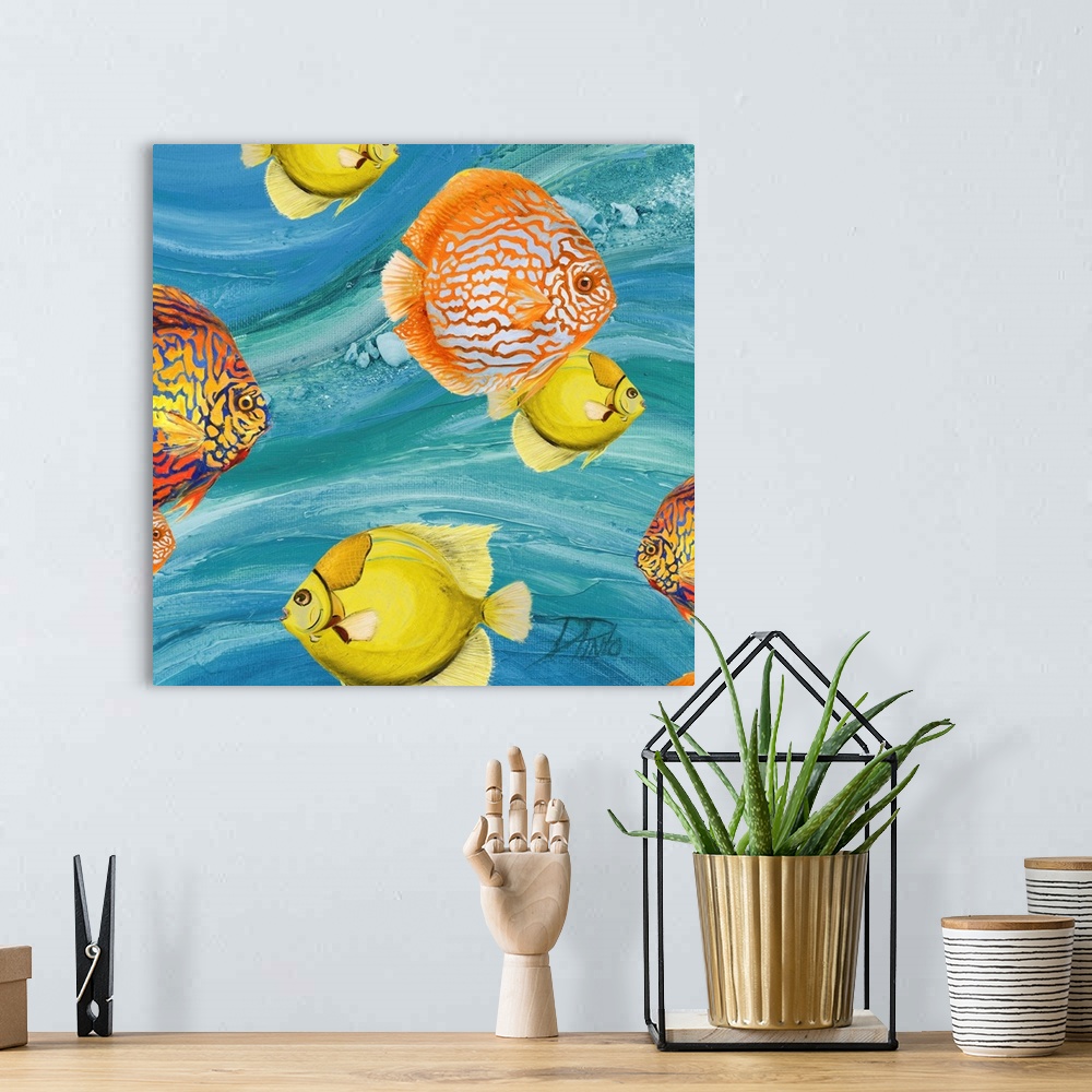 A bohemian room featuring Decorative artwork of a group of tropical fish in yellow and orange.
