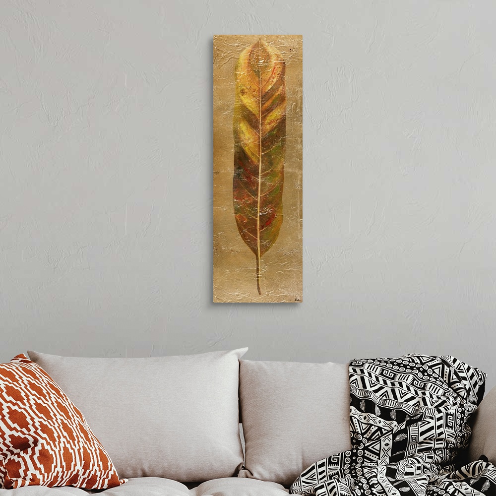 A bohemian room featuring Contemporary painting of a broad leaf in gold tones.