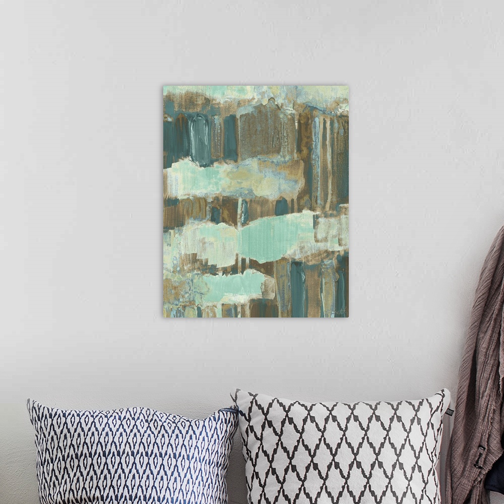 A bohemian room featuring Abstract art in earthy shades of blue and brown.