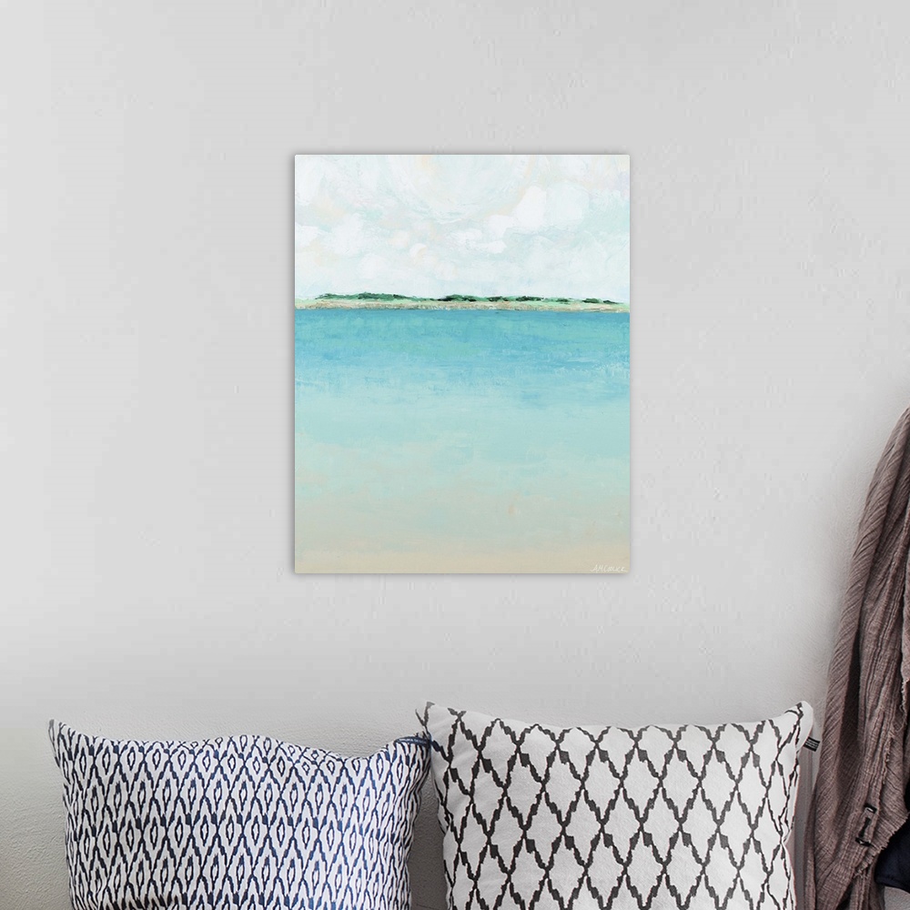 A bohemian room featuring View of a distant island across cool blue water.