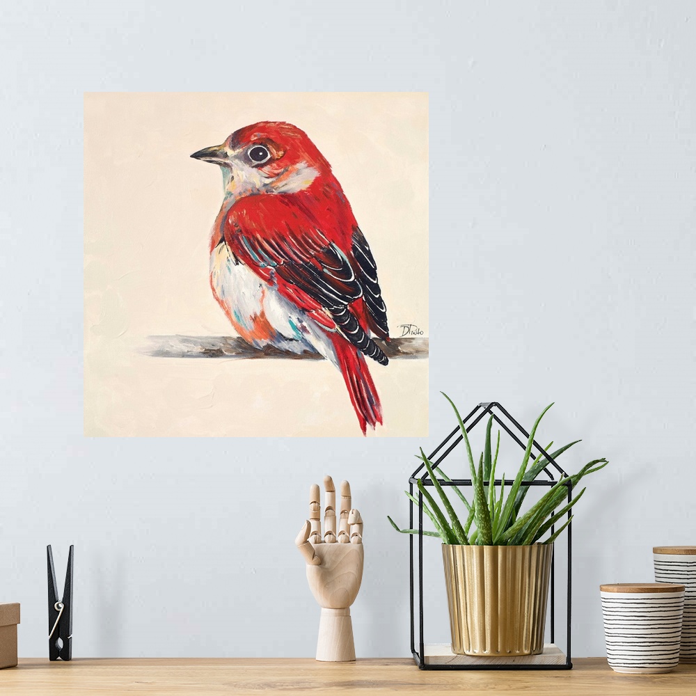 A bohemian room featuring Painting of a bright red little bird perched on a twig.