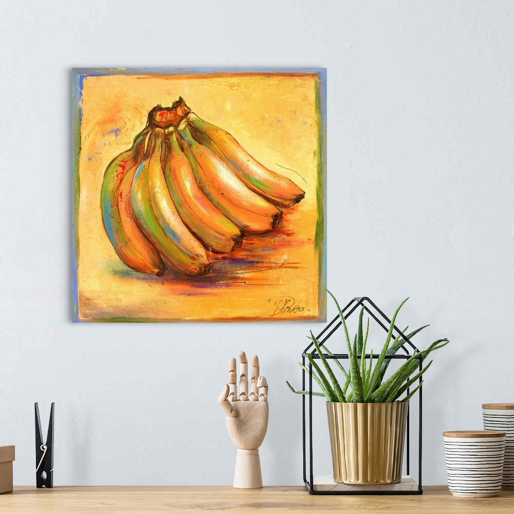 A bohemian room featuring A warm contemporary still life painting of bananas with colorful highlights and some paint splatter.