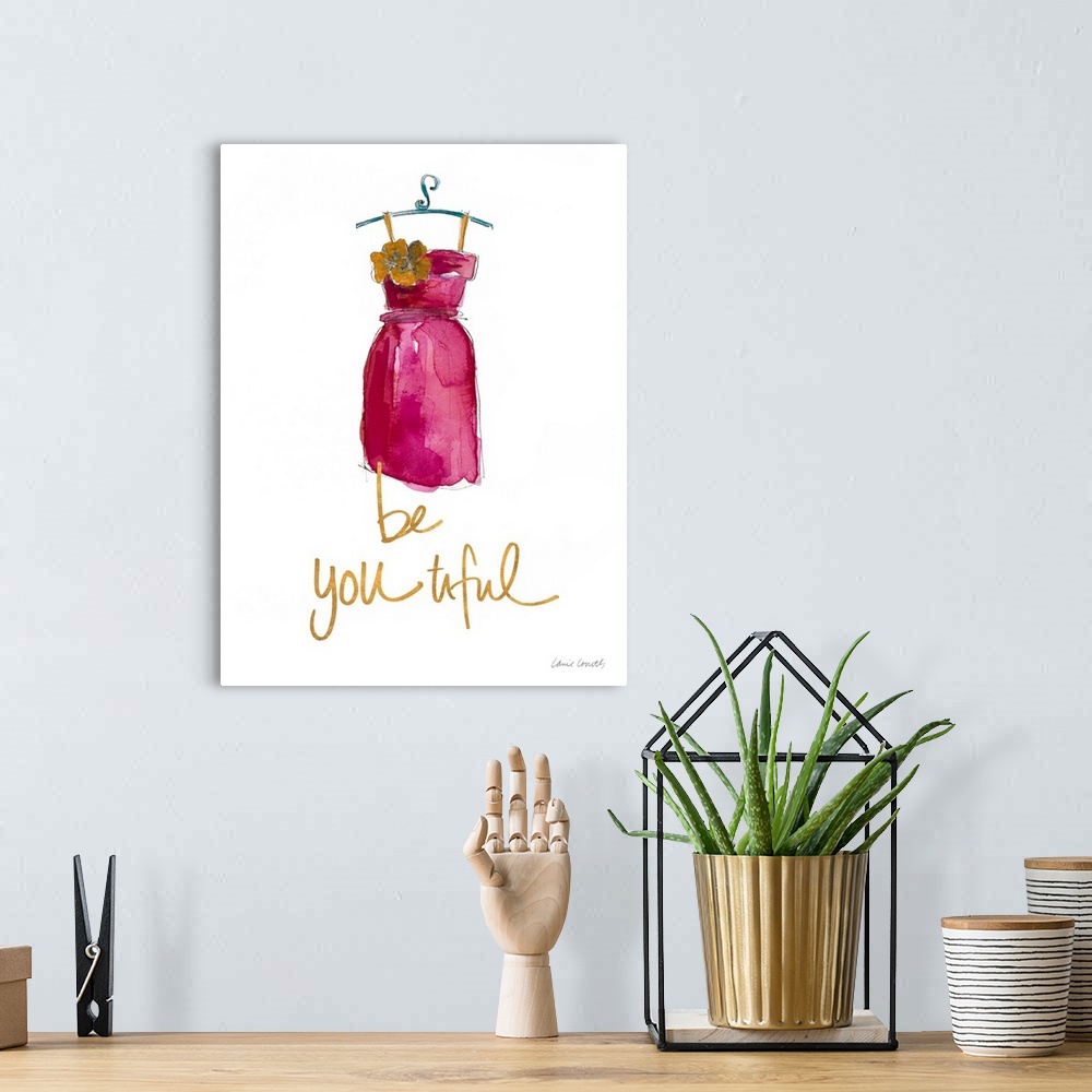 A bohemian room featuring Watercolor painting of a pink dress with a big yellow flower on the breast and the phrase "Be You...