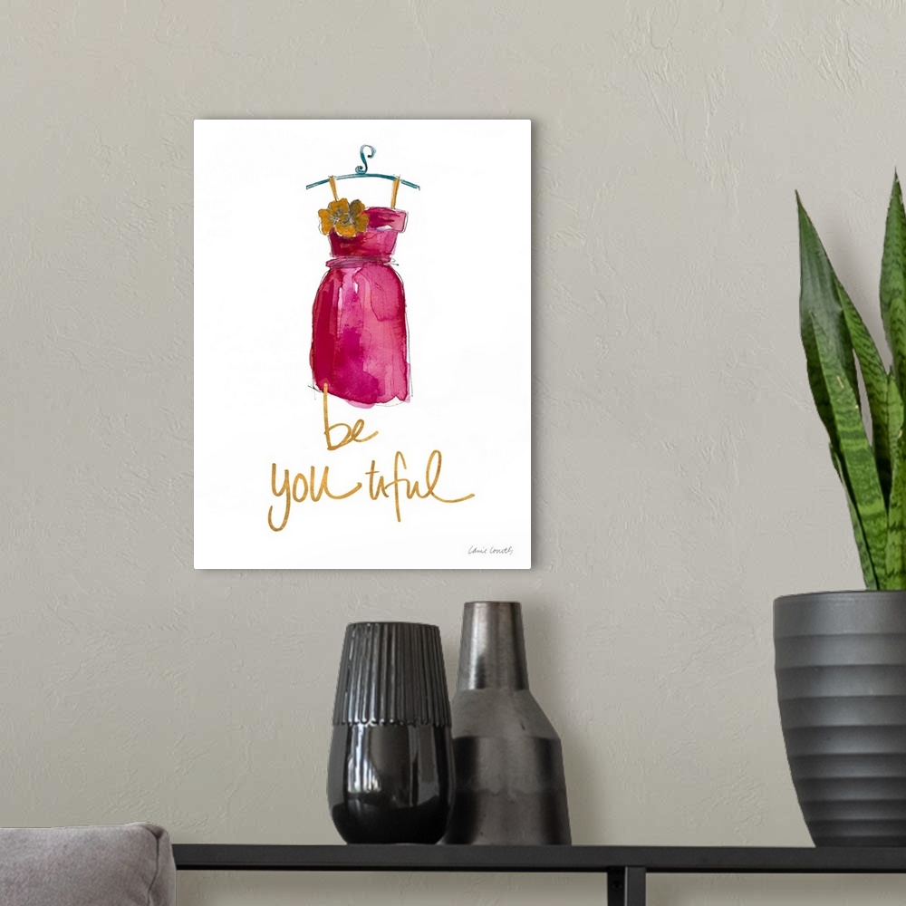 A modern room featuring Watercolor painting of a pink dress with a big yellow flower on the breast and the phrase "Be You...