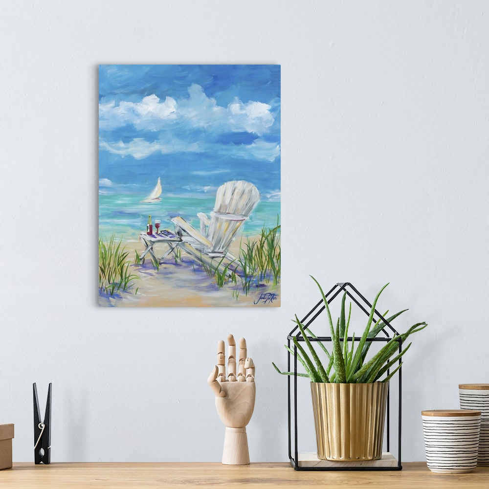 A bohemian room featuring Contemporary painting of a relaxing beach scene with a white beach chair and a table with red win...