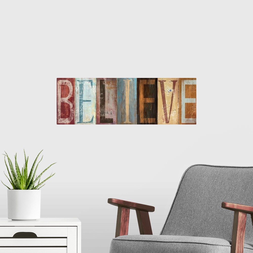 A modern room featuring The word "Believe" with each letter painted in a different style in muted colors, with a worn, we...