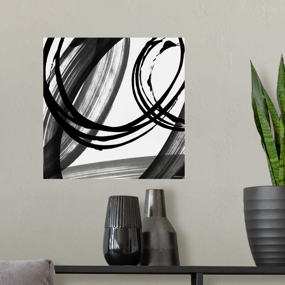 A modern room featuring A contemporary abstract painting with big circles using black and white hues.
