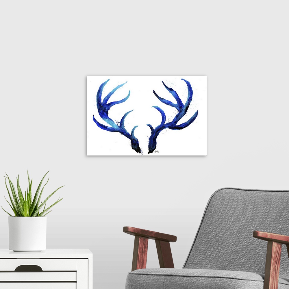 A modern room featuring Watercolor painting of a set of blue antlers with light paint splatter around on a white background.