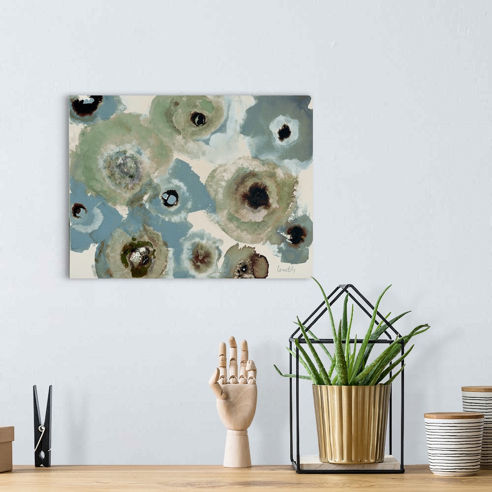 A bohemian room featuring Semi-abstract artwork of a group of blue and grey flowers.