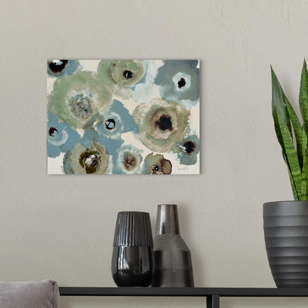 A modern room featuring Semi-abstract artwork of a group of blue and grey flowers.
