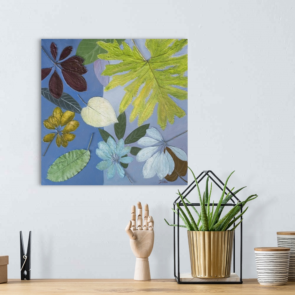 A bohemian room featuring A contemporary cool toned painting of a variety of different leaves.