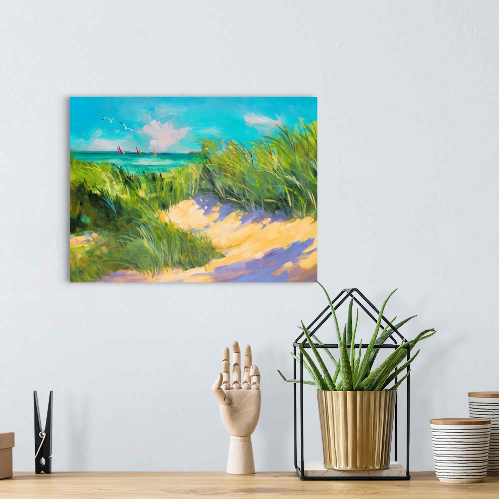 A bohemian room featuring Contemporary painting of a realizing beach scene. The ocean is framed by dune grass bending in th...