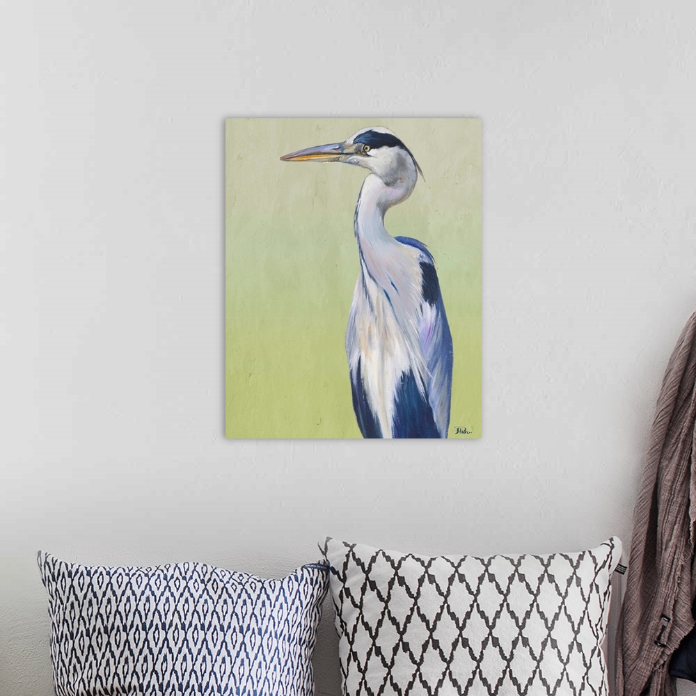 A bohemian room featuring Contemporary painting of a Great Blue Heron against a pale green background.