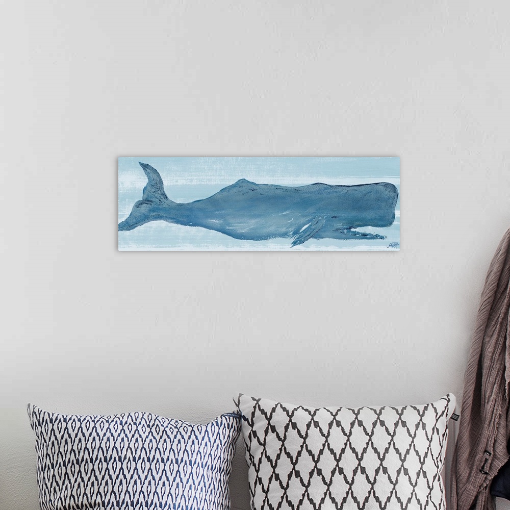 A bohemian room featuring Painting of a large blue whale in the ocean.