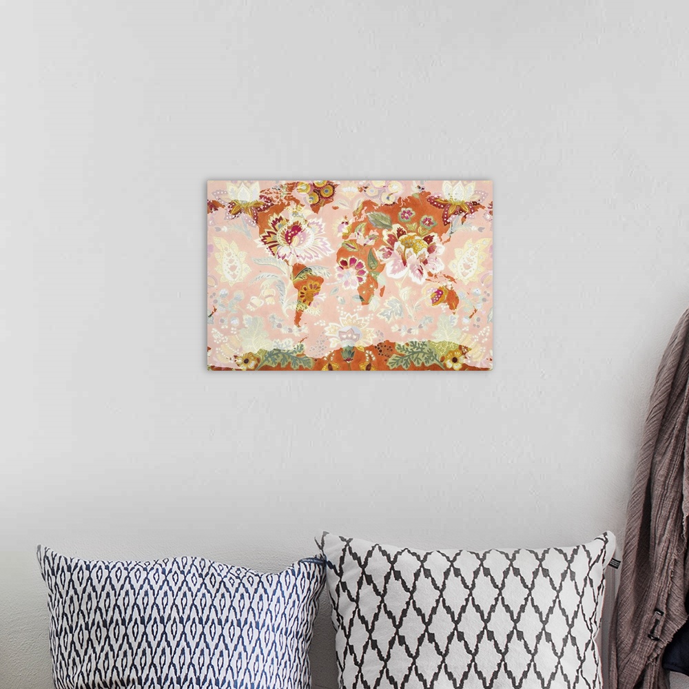 A bohemian room featuring A map of the world with a bright orange floral pattern.