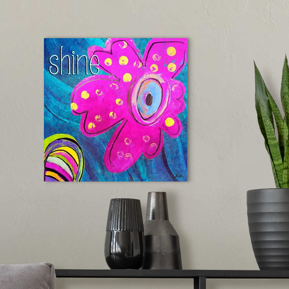 A modern room featuring A colorful abstract painting of flowers with the word "shine" at the top left corner.