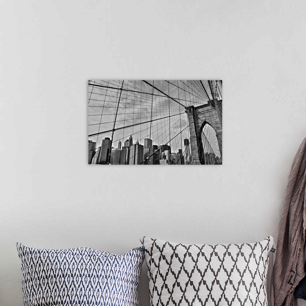 A bohemian room featuring View of the cables from the Brooklyn Bridge with the New York City skyline in the distance.