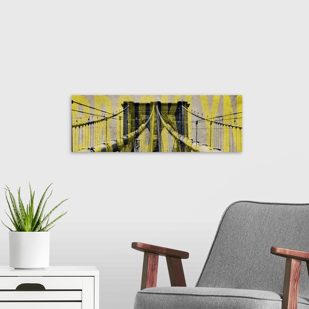 A modern room featuring One of the towers of the Brooklyn Bridge with "Brooklyn" in yellow lettering.