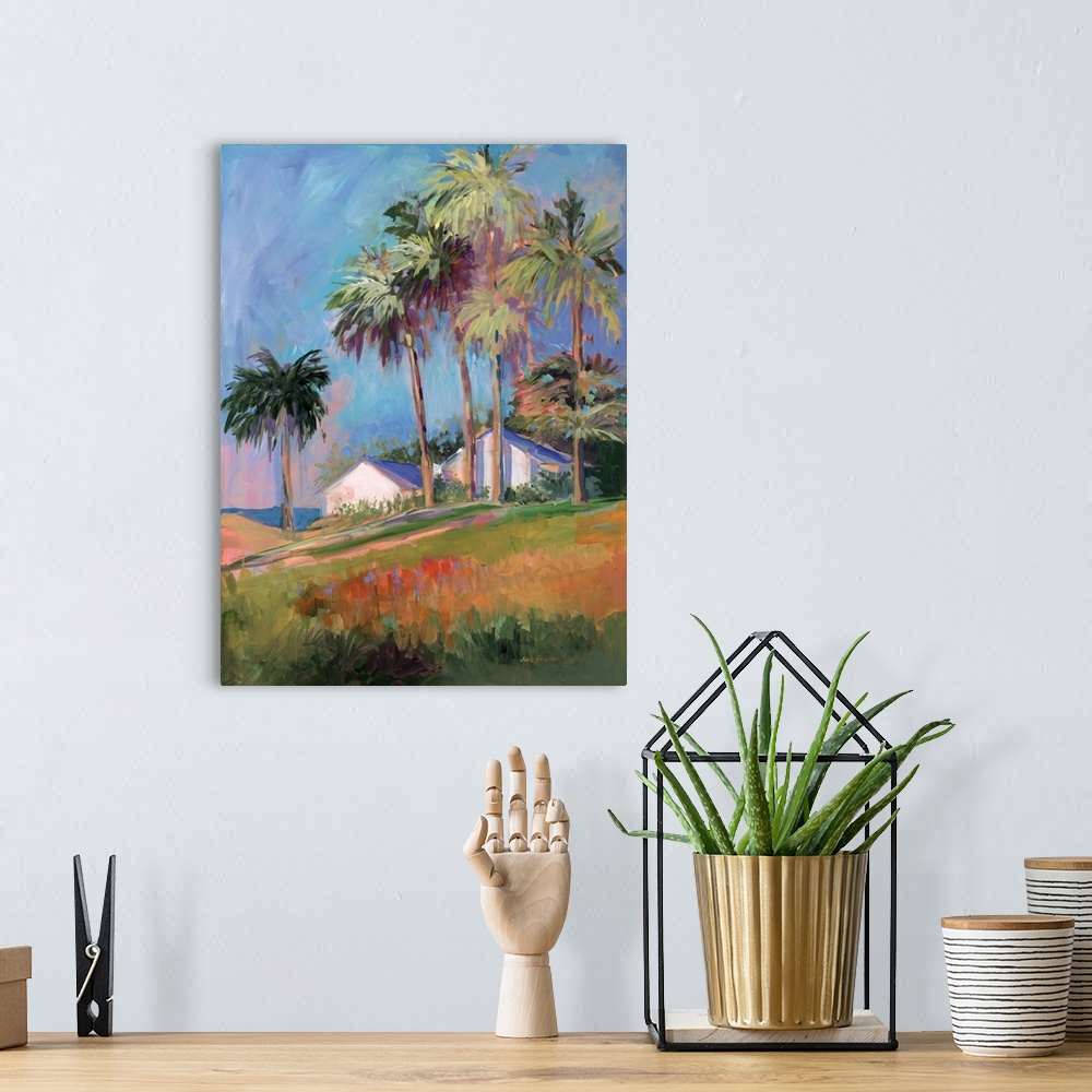 A bohemian room featuring Contemporary painting of a house surrounded by tall palm trees on the coast.