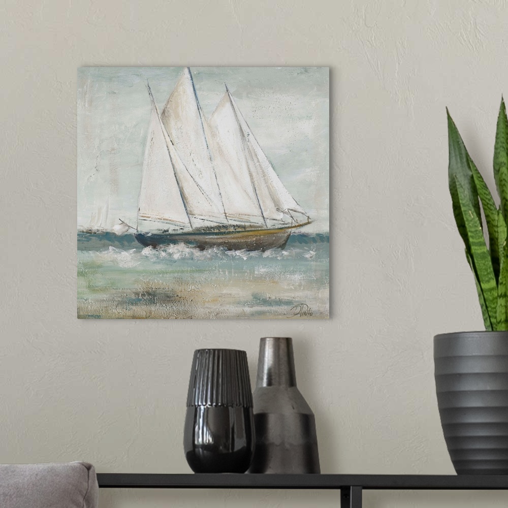 A modern room featuring Painting of a sailboat gracefully traversing the seas.
