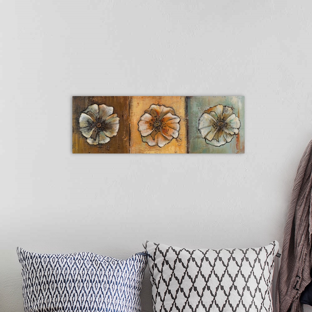 A bohemian room featuring Oil painting of three round flowers in sepia tones, arranged in a row, giving the impression of a...