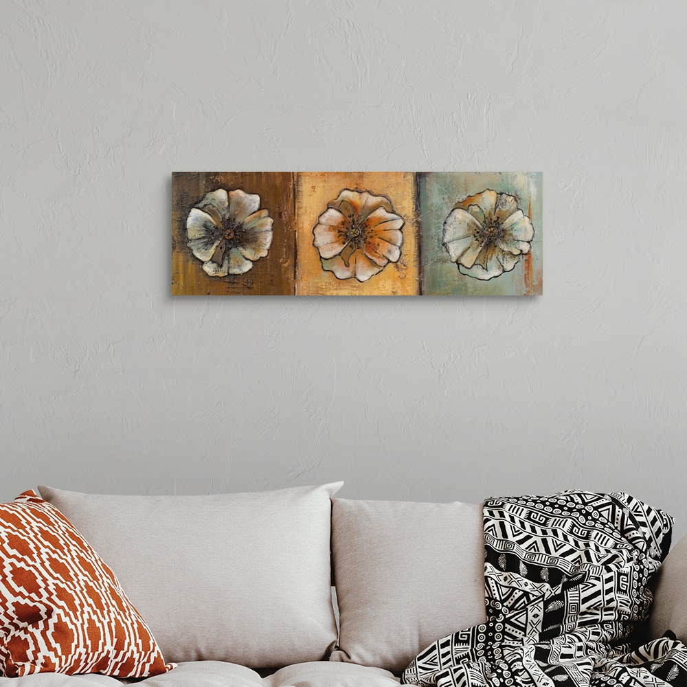 A bohemian room featuring Oil painting of three round flowers in sepia tones, arranged in a row, giving the impression of a...