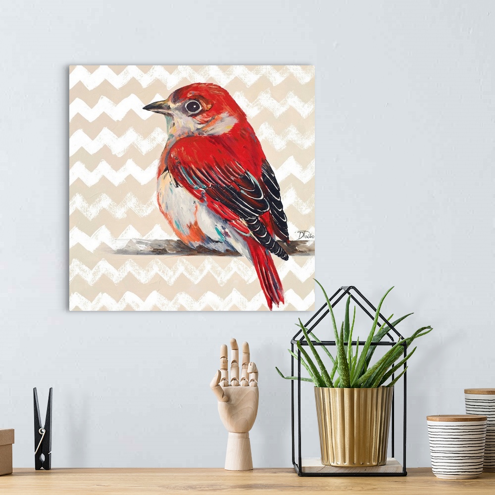 A bohemian room featuring Contemporary painting of a red bird against a beige chevron pattern.