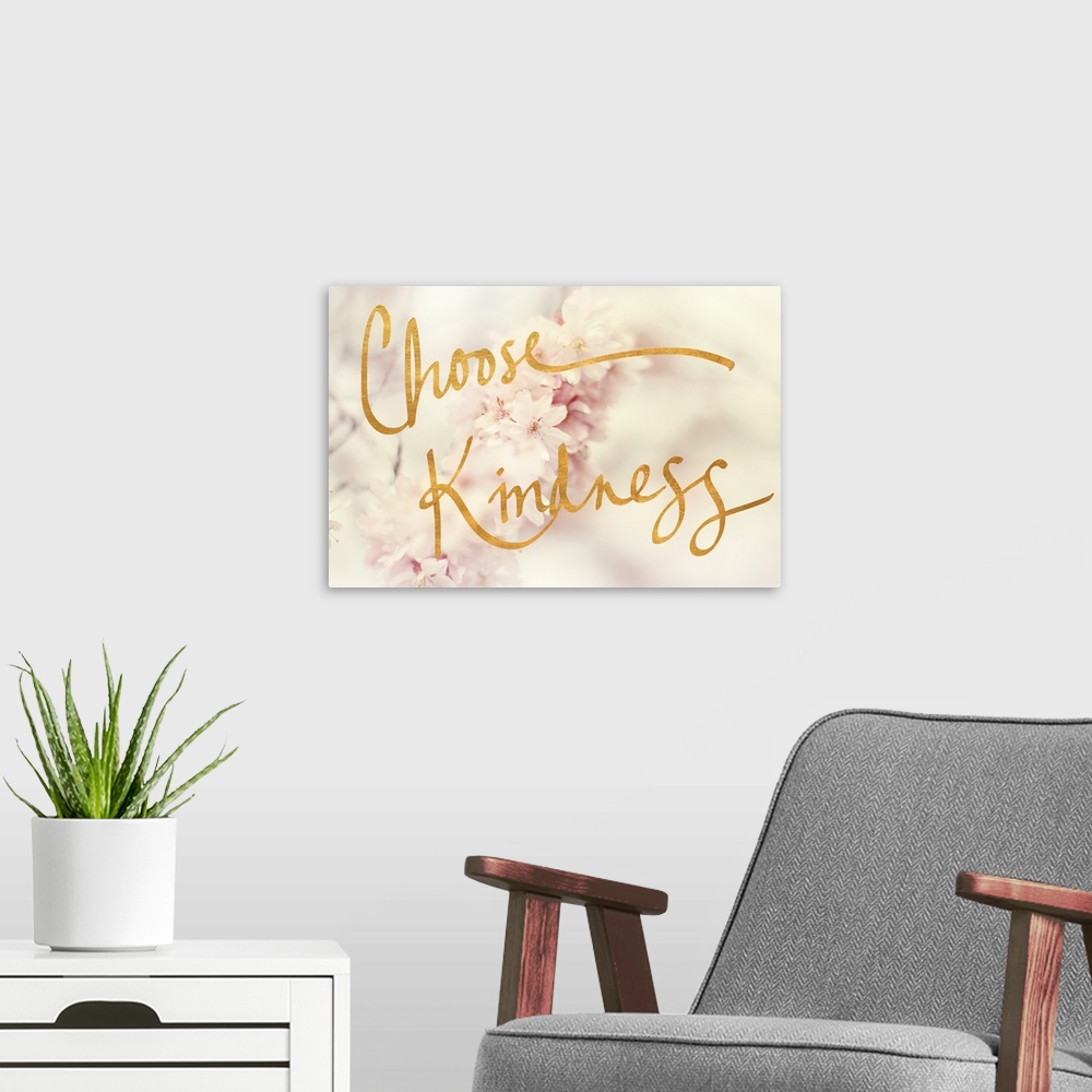 A modern room featuring "Choose Kindness" written in gold on top of a dreamy, shallow depth of field photograph of white ...