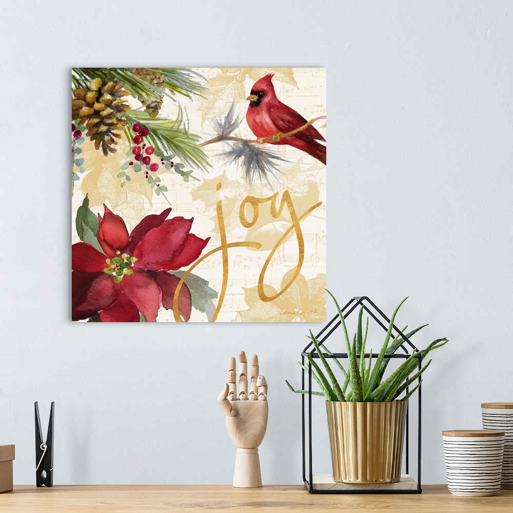 A bohemian room featuring Seasonal holiday artwork featuring a poinsettia and a cardinal, with the word "Joy."