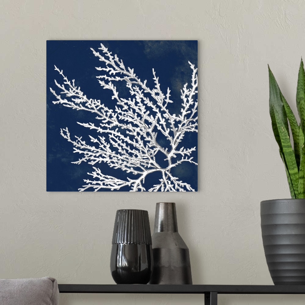 A modern room featuring A drawing of coral over a dark ink washes in this square decorative wall art.