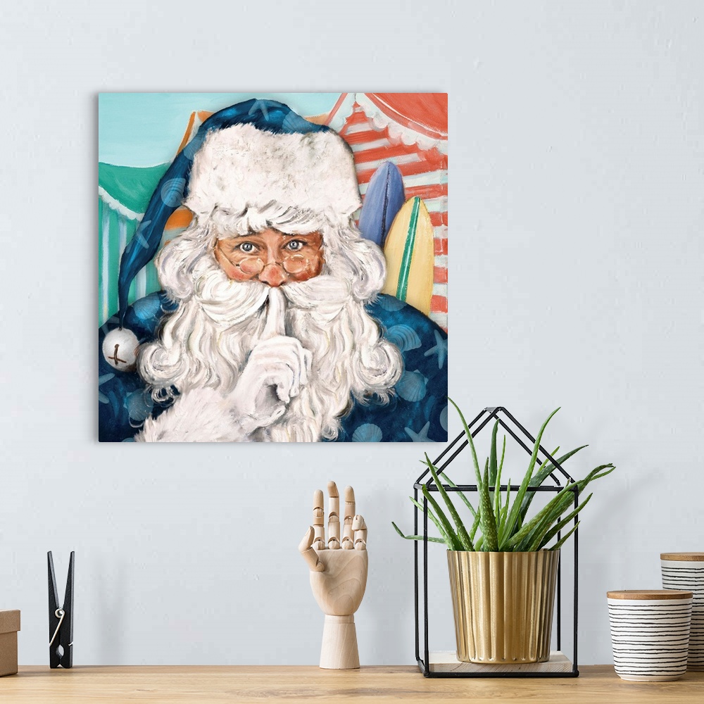 A bohemian room featuring Painting of Santa Claus dressed in blue on the beach.