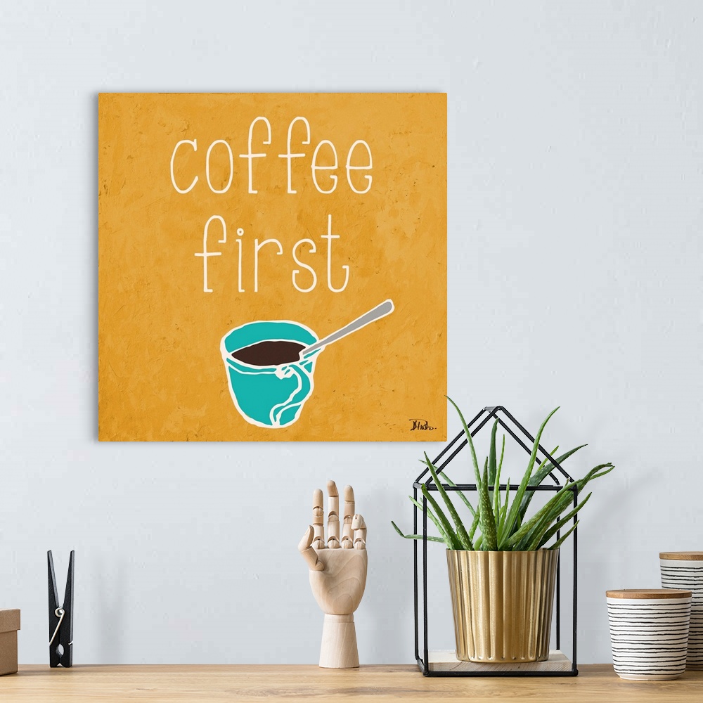 A bohemian room featuring "Coffee First" on a square yellow background