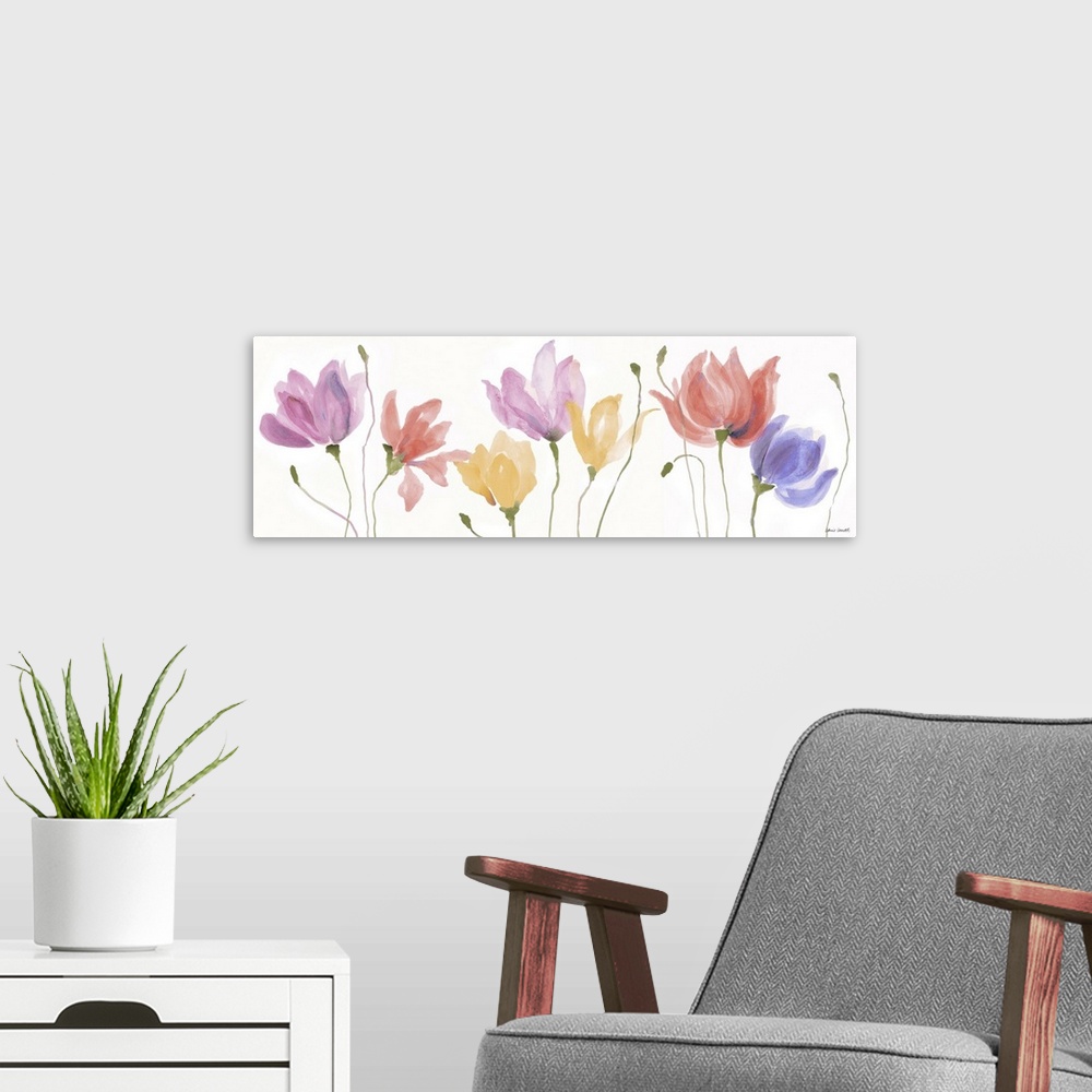 A modern room featuring A long horizontal watercolor painting of colorful Spring flowers in a row.