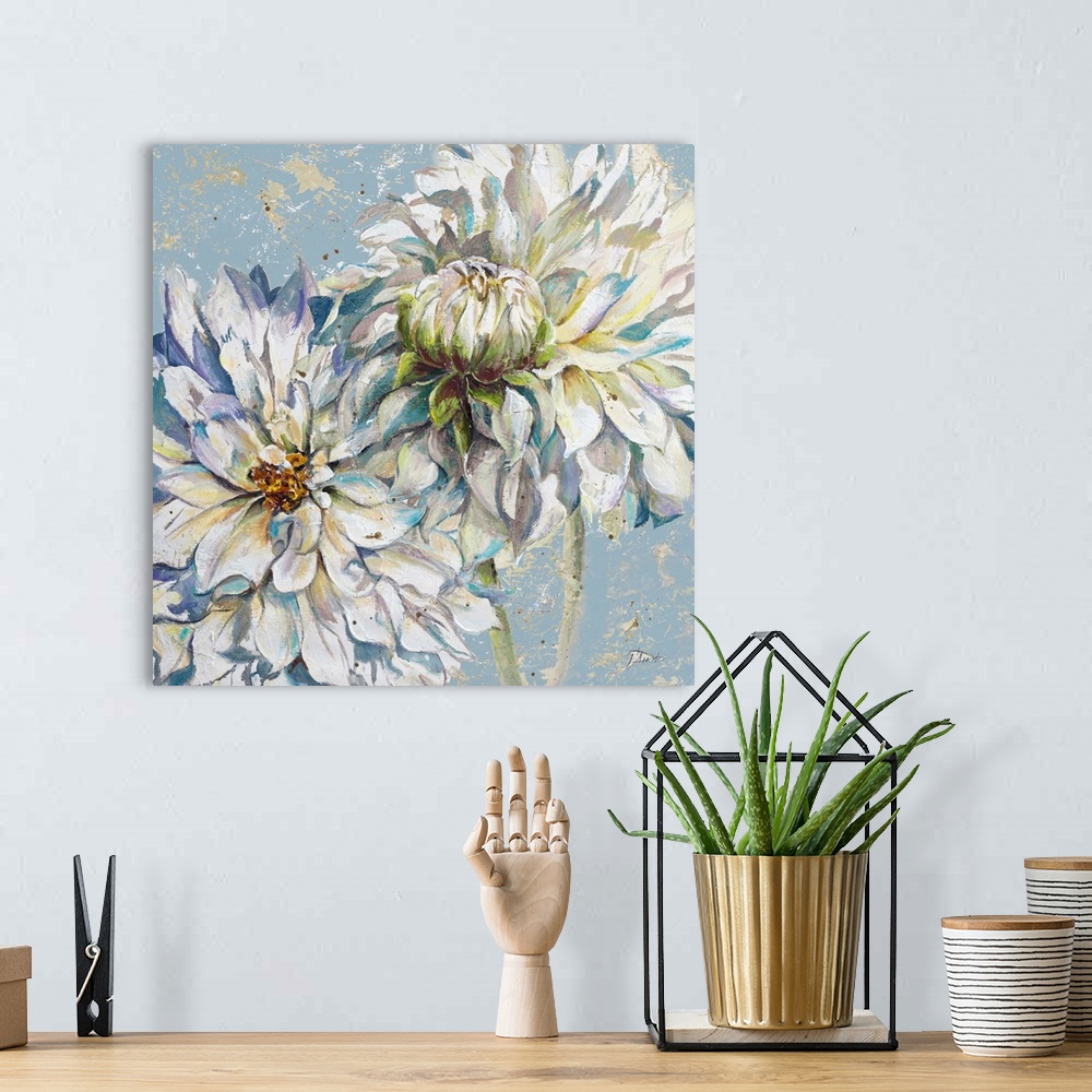 A bohemian room featuring A contemporary painting of two cool toned dahlias on a blue and tan background.